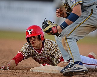 NILES, OHIO - APRIl 3, 2019: Youngstown State's Phillip Glasser steals third base beating the tag from Kent State's Kian O'Brien in the ninth inning of their game, Wednesday evening at Eastwood Field. Youngstown State won 4-3 in eleven innings. DAVID DERMER | THE VINDICATOR