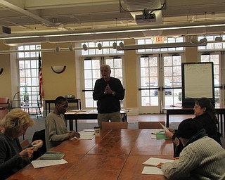 Neighbors | Jessica Harker.Ron Saffell taught the first of six classes in French 2 March 13 at the Poland library.