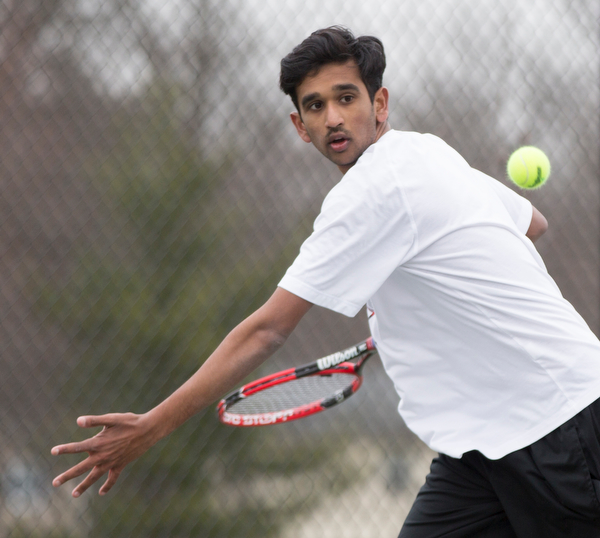 Canfield junior Sirin Nalluri gets ready to hit the ball during a match against Howland at Canfield High School on Thursday. EMILY MATTHEWS | THE VINDICATOR