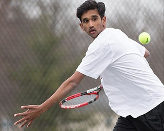 Canfield junior Sirin Nalluri gets ready to hit the ball during a match against Howland at Canfield High School on Thursday. EMILY MATTHEWS | THE VINDICATOR
