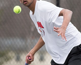 Canfield junior Sirin Nalluri gets ready to hit the ball during a match against Howland at Canfield High School on Thursday. EMILY MATTHEWS | THE VINDICATOR