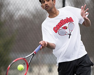 Canfield junior Sirin Nalluri hits the ball during a match against Howland at Canfield High School on Thursday. EMILY MATTHEWS | THE VINDICATOR