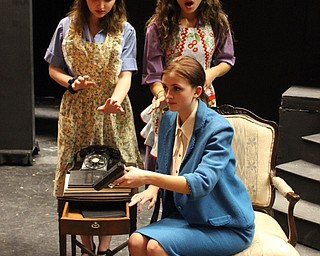 Neighbors | Abby Slanker.In the Canfield High School Players’ presentation of “The Twilight Zone,” Lauren Johnson, seated, portrayed Professor Ellis Fowler and Abby Palmer, left, and Emily Dunlap, right, portrayed housekeepers from the episode “The Changing of the Guard.”