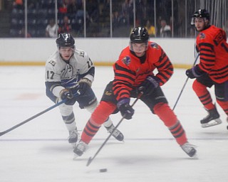 Phantoms' Jeppe Urup carries the puck while Stampede's Ryan Sullivan comes up behind him during their game on Friday night. EMILY MATTHEWS | THE VINDICATOR