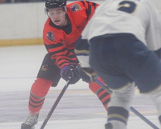 Phantoms' Ben Schoen tries to keep the puck from Stampede's Matt Kessel during their game on Friday night. EMILY MATTHEWS | THE VINDICATOR