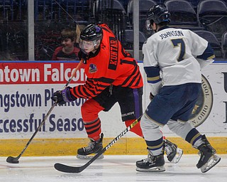 Phantoms' Trevor Kuntar tries to keep the puck from Stampede's Ryan Johnson during their game on Friday night. EMILY MATTHEWS | THE VINDICATOR