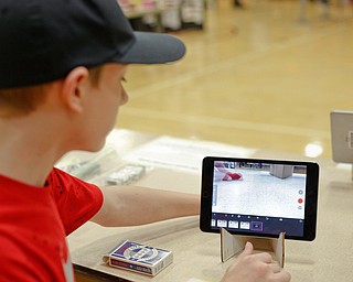 Richard Both, 13, an eighth grader at Glenwood Junior High School, demonstrates how to do stop-motion claymation during STEAM night at Glenwood Junior High School on Friday night. EMILY MATTHEWS | THE VINDICATOR