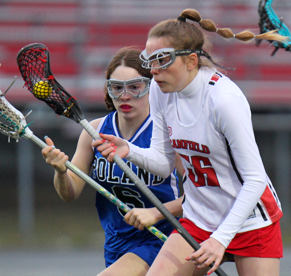 William D. Lewis The vindicator  Canfield's Tara Santaro(36) moves the ball past Poland's Emille Franco(6) during 4-5-19 game with Poland.