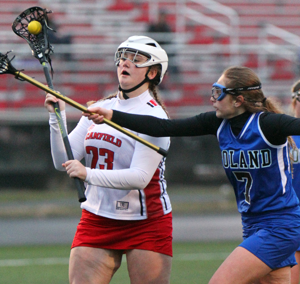William D. Lewis The vindicator  Canfield's Geena Cianciolla(23) moves the ball around Poland's sarah Leach(7) during 4-5-19 game with Poland.