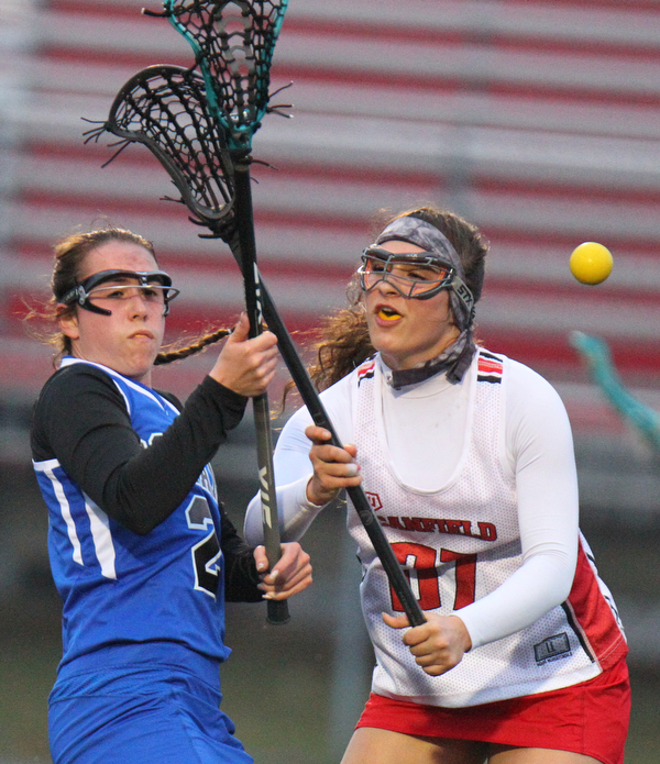 William D. Lewis The vindicator  Canfield'sAthena Poullas(37) and Poland's Allyson andrews(2) during 4-5-19 game with Poland.
