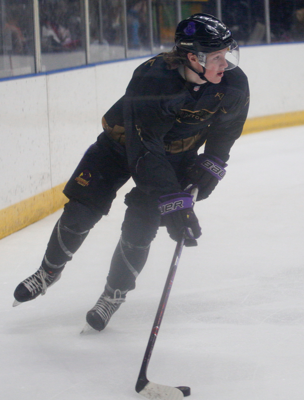 Phantoms' Tristan Amonte takes the puck behind the net during the second period of their game against Stampede Saturday night. EMILY MATTHEWS | THE VINDICATOR