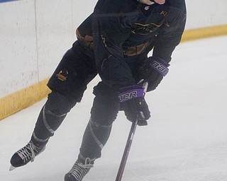 Phantoms' Tristan Amonte takes the puck behind the net during the second period of their game against Stampede Saturday night. EMILY MATTHEWS | THE VINDICATOR