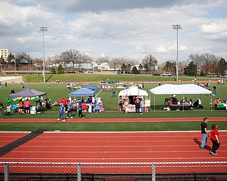 Relay for Life participants walk around the track at Farmers National Bank Field Saturday afternoon. EMILY MATTHEWS | THE VINDICATOR