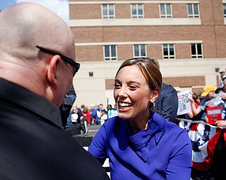 Andrea Ryan, the wife of Tim Ryan, greets the crowd during his presidential kickoff rally on Federal Street Saturday afternoon. EMILY MATTHEWS | THE VINDICATOR