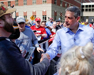 Tim Ryan greets the crowd during his presidential kickoff rally on Federal Street Saturday afternoon. EMILY MATTHEWS | THE VINDICATOR