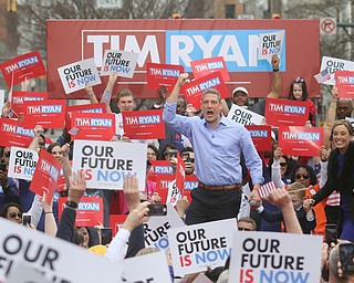  ROBERT K.YOSAY  | THE VINDICATOR..Congressman Tim Ryan  opened his run for president in Downtown Youngstown as supporters gathered and cheeered..Tim Ryan pumped up as he entered the stage with wife Andrea