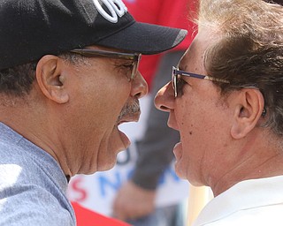  ROBERT K.YOSAY  | THE VINDICATOR..Congressman Tim Ryan  opened his run for president in Downtown Youngstown as supporters gathered and cheeered..toe to toe as Robert Jiles of Younstown (left) and trump supporter Carmen Pecchio go toe to toe..