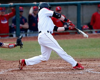  NILES, OHIO - April 6, 2019:  During the 3rd inning, Youngstown State Penguins' Trevor Wiersma (19)  hits 2 out rbi single at Eastwood Field. Photo by MICHAEL G. TAYLOR | THE VINDICATOR