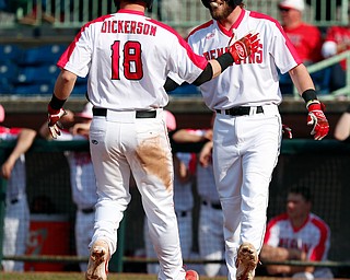  NILES, OHIO - April 6, 2019:  During the 7th inning, after scoring, Youngstown State Penguins' Drew Dickerson (18) is greeted by his teammate Jeff Wehler (7) at Eastwood Field. Photo by MICHAEL G. TAYLOR | THE VINDICATOR