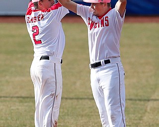  NILES, OHIO - April 6, 2019: Youngstown State Penguins' Phillip Glasser (2) and Cody Dennis (10) celibrate 6-5 victory at Eastwood Field. Photo by MICHAEL G. TAYLOR | THE VINDICATOR