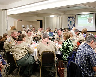 Scouts, leaders, and their family members eat dinner at the Whispering Pines Recognition Dinner in St. James Episcopal Church in Boardman on Sunday. EMILY MATTHEWS | THE VINDICATOR