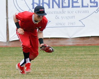 YSU's Lucas Nasonti fields the ball in the outfield during their game against UIC on Sunday afternoon. YSU lost 8-3.