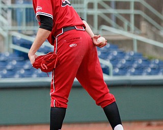 YSU's Brett Souder looks to first before pitching the ball during their game against UIC on Sunday afternoon. YSU lost 8-3.