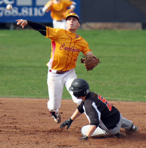 William D. Lewis The Vindicator  Springfield's John Slike(5) is out as Mooney's John Mikos(4) turns a double play during