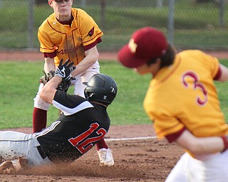William D. Lewis The Vindicator  Springfield's Shane Eynon(12) is out while trying to steal 3rd as Mooney 3rd basemanIan Francis92) make the tag. Money Pitcher Ethan Shaw(3) is on the mound.