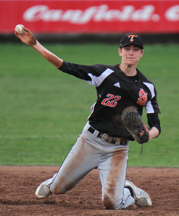 William D. LewisThe Vindicator  Springfield's Drew Clark fields a ground ball during 4-8-19 win over Mooney at Cene.