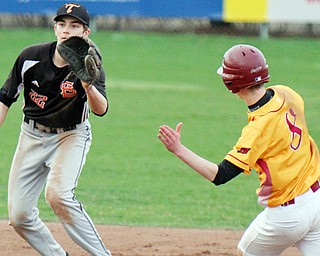 Mooney's AJ Pepperney (8) is out at 2nd as Springfield's Drew Clark (22) makes the catch during 4-8-19 action at Cene Park in Struthers.
