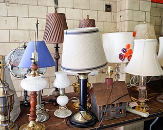 Lamps are among the many items that will be for sale in the furniture room at the Angels for Animals garage sale that is taking place Friday through Sunday at the Canfield Fairgrounds. EMILY MATTHEWS | THE VINDICATOR