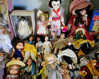 Dolls are among the many items that will be for sale in the antique room at the Angels for Animals garage sale that will be taking place Friday through Sunday at the Canfield Fairgrounds. EMILY MATTHEWS | THE VINDICATOR