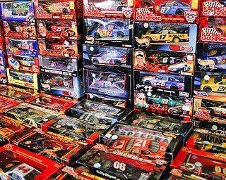 Replica miniature race cars are among the many items that will be for sale in the antique room at the Angels for Animals garage sale that will be taking place Friday through Sunday at the Canfield Fairgrounds. EMILY MATTHEWS | THE VINDICATOR