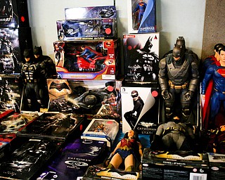 Superhero figurines are among the many items that will be for sale in the antique room at the Angels for Animals garage sale that will be taking place Friday through Sunday at the Canfield Fairgrounds. EMILY MATTHEWS | THE VINDICATOR