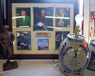 Antique golf memorabilia among the many items that will be for sale in the antique room at the Angels for Animals garage sale that will be taking place Friday through Sunday at the Canfield Fairgrounds. EMILY MATTHEWS | THE VINDICATOR