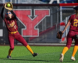 YOUNGSTOWN, OHIO - APRIL 9, 2019: Mooney's Lexi Diaz fields the ball after a RBI-single by Ursuline's Destiny Goodnight in the third inning of Tuesday afternoons game at Youngstown State Softball Complex. DAVID DERMER | THE VINDICATOR