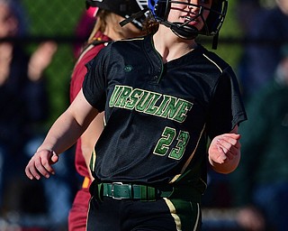 YOUNGSTOWN, OHIO - APRIL 9, 2019: Ursuline's Alyssa Sheely scores a run after a RBI-single by Destiny Goodnight in the third inning of Tuesday afternoons game at Youngstown State Softball Complex. DAVID DERMER | THE VINDICATOR