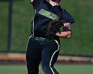 YOUNGSTOWN, OHIO - APRIL 9, 2019: Ursuline's Julia Nutter throws to first for the out in the fourth inning of Tuesday afternoons game at Youngstown State Softball Complex. Mooney's Alaina Scavina would be out at first. DAVID DERMER | THE VINDICATOR