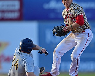 NILES, OHIO - APRIL 10, 2019: Youngstown State's Phillip Glasser looks to first after forcing out Toledo's Trace Hatfield at second base in the sixth inning of Wednesday nights game at Eastwood Field. Youngstown State won 5-3. DAVID DERMER | THE VINDICATOR