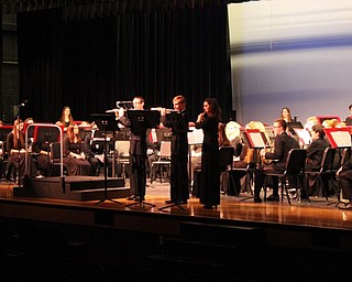 Neighbors | Abby Slanker.The Flute Trio of Gia Martin, David Schmidt and Nicholas Krcelic performed “Allegro Giocoso” at the Canfield High School Bands Winter Concert on March 5.  .