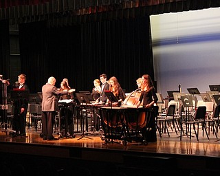 Neighbors | Abby Slanker.Under the direction of David Drevna, the Canfield High School Concert Band Percussion Ensemble of Madison Duke, Joy Jenkins, Julia Sansoterra, Ashley Scalzo, Christopher Smallwood, Zachary Smith, Cadin Tsvetkoff, Madison Zets and Taylor Zets performed “Balalaikan Holiday” at the WInter Concert on March 5.