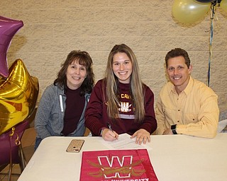 Neighbors | Abby Slanker.Canfield High School senior softball player Kalin Kovach was joined by her parents, Colette and Michael Kovach, as she signed her letter of intent to continue her softball and academic career at Walsh University at a signing ceremony at the high school on March 15.