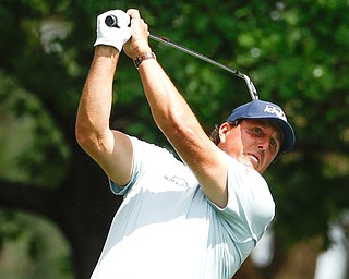 Phil Mickelson is one shot back in the 83rd Masters, the year's first major golf tournament, at Augusta National. Brooks Koepka and Bryson DeChambeau are tied for the lead after Thursday's opening round.