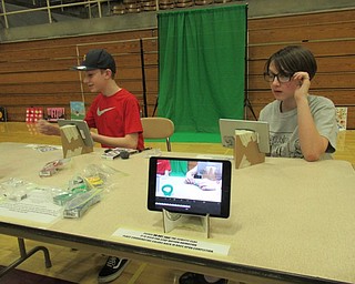 Neighbors | Jessica Harker.Glenwood students instructed community members on how to create your own stop motion animation video April 5 as part of the school's annual STEAM Night.