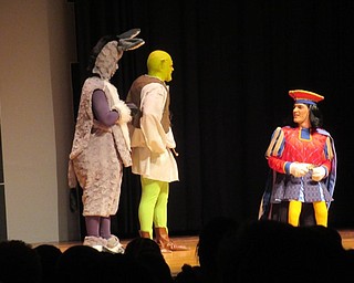 Neighbors | Jessica Harker .Anthony Koulianos, Donkey, Luke Lankitus, Shrek, and Maguire Franko as Farquad performed in Poland High School's "Shrek the Musical" on April 4.