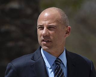 In this April 1, 2019 file photo, attorney Michael Avenatti arrives at federal court in Santa Ana, Calif. An indictment filed against Avenatti, Wednesday, April 10, alleges he stole millions of dollars from clients, didn’t pay his taxes, committed bank fraud and lied in bankruptcy proceedings.
