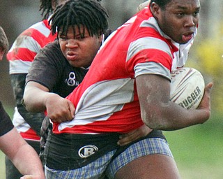 William D. Lewis The vindicator  Chaney's Terrqance Love(1) eludes a Canton defender during 4-12-19 action at Chaney.