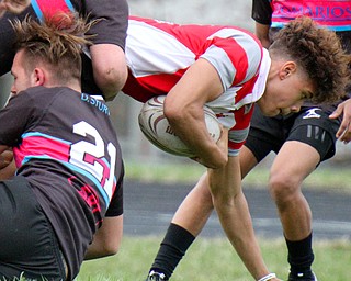 William D. Lewis The vindicator  Chaney's Christian Jones(12) is stopped  during 4-12-19 action at Chaney.
