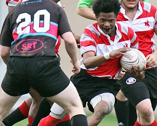 William D. Lewis The vindicator  Chaney's TeShawn Jones(11) cuts downfield during 4-12-19 action at Chaney.